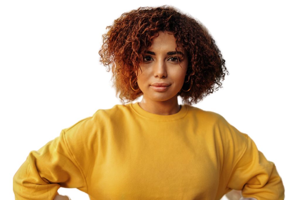 Young black woman in a yellow sweater, smiling - Embodying support and care at Problem Pregnancy Center, offering alternatives to abortion clinics in Detroit, Michigan.