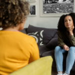 Image of an options counselor speaking with a client about her options for the Problem Pregnancy Center in Southfield, Michigan.