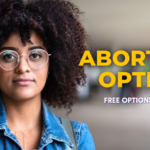 This is a header image for the Problem Pregnancy Center's blog article, Abortion Options in Michigan. the image is of a portrait of a young black woman with text that reads, "Abortion Options, Free Options Counseling".