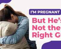 Young woman hugging a pillow and crying, with text that says “I’m pregnant, but he’s not the right guy” – unplanned pregnancy support image