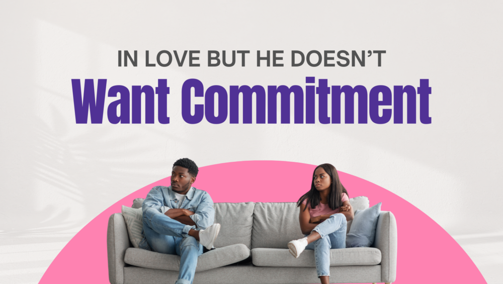 Couple sitting apart on a couch with tension — young woman facing an unplanned pregnancy with a partner who doesn’t want commitment in Southfield, Michigan.