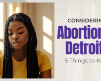 Woman in Detroit exploring options and support when considering abortion.