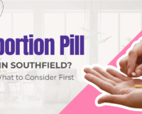 Abortion pill in Southfield. Close-up of medication tablets in woman's hand next to article title.
